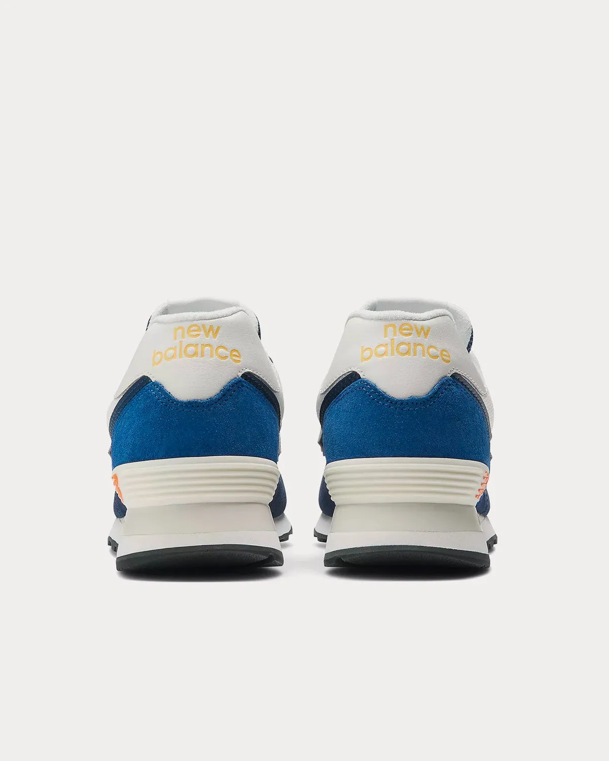 574 Navy / Black Low Top Sneakers